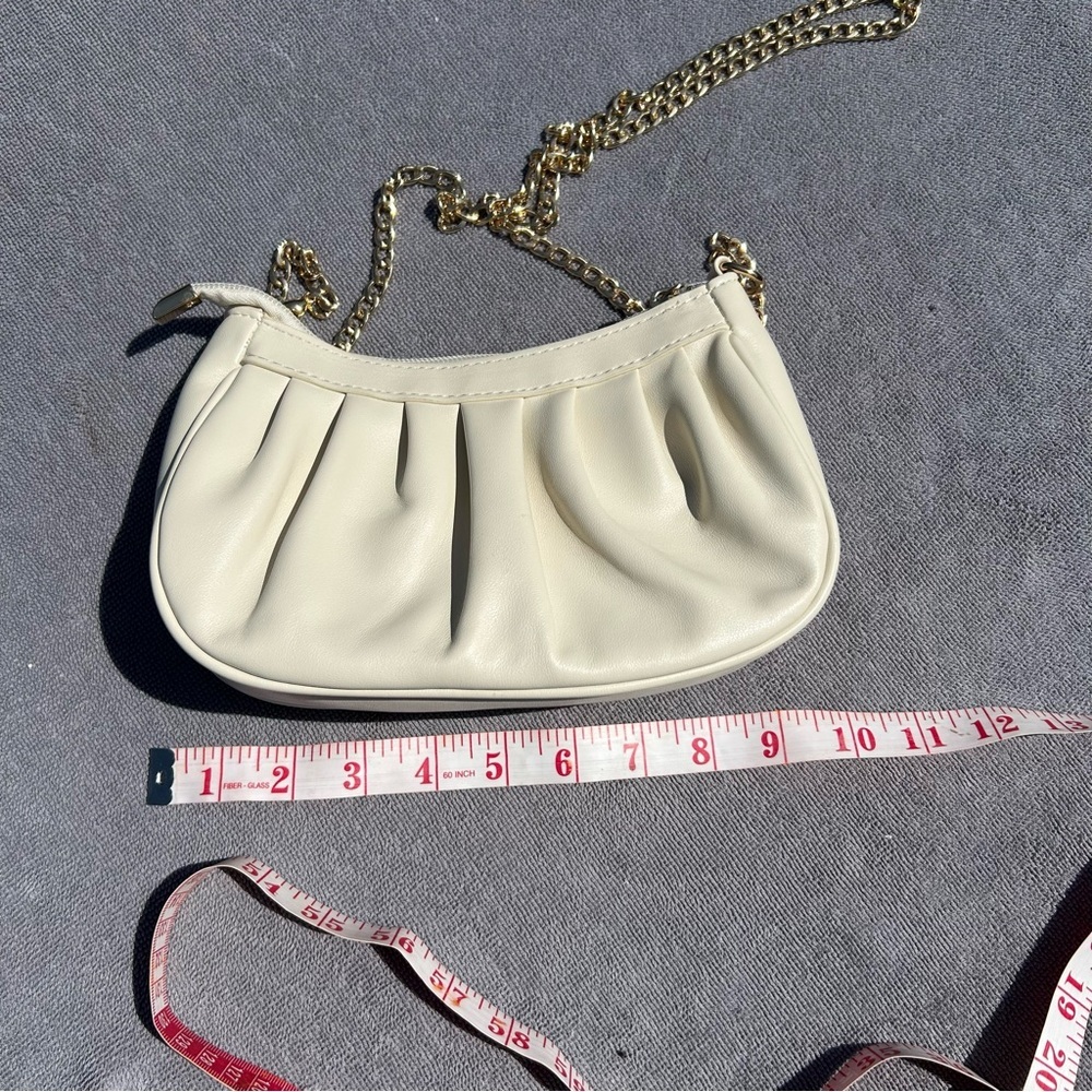 Elegant off white/Cream Shoulder Bag with beautiful gold accents